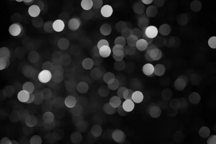 Black-and-white blurred lights, like a stage seen out of focus