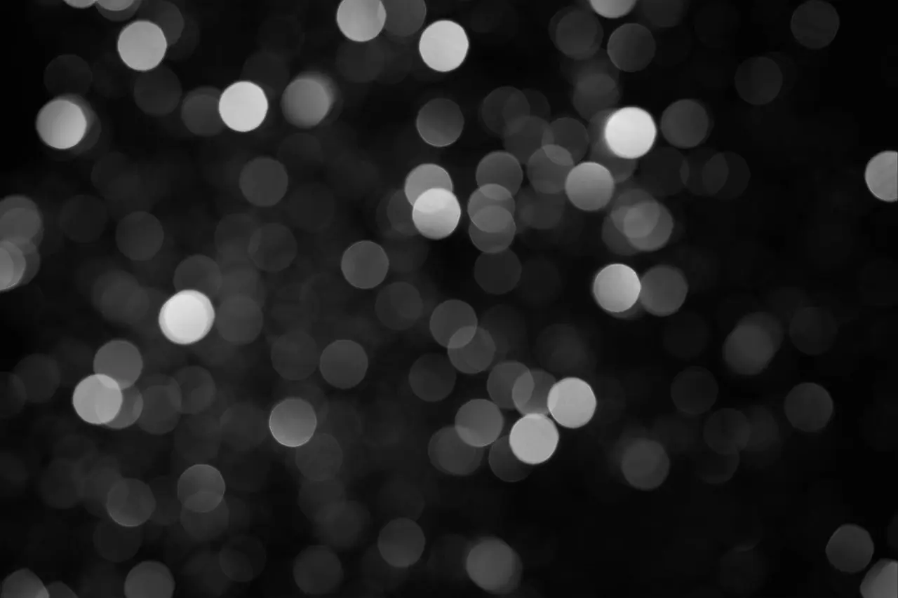 Black-and-white blurred lights, like a stage seen out of focus